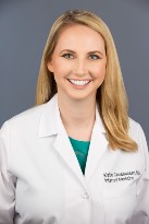 Doctor Christiansen headshot in white coat